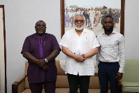 Koku Anyidoho and Kofi Atta Mills share a photo with the late JJ Rawlings