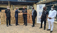 Tema Police Command receiving the items