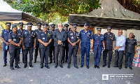 Former President Jerry John Rawlings poses with the Police and EC delegation