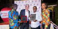 Safety transporter of the year Duah Boakye with some managers of Total Ghana