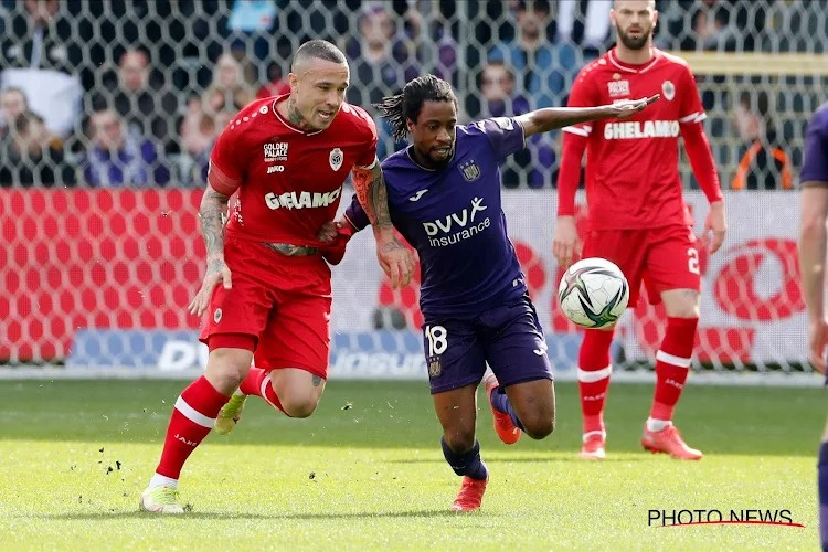 Ashimeru (right) challenges for a ball in the game