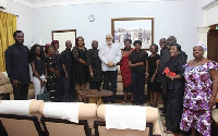 Former President Jerry John Rawlings with the family of the late V.C.R.A.C Crabbe