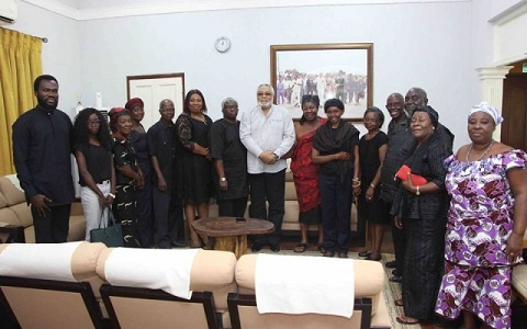 Former President Jerry John Rawlings with the family of the late V.C.R.A.C Crabbe