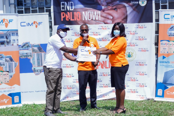 Officials of CIMAF Ghana in a pose after the exercise