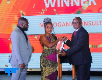 Paul Asare Ansah in black suit at his induction ceremony as a fellow