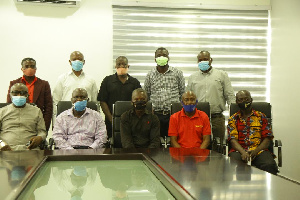 A delegation of family and ex-team mates with GFA officials