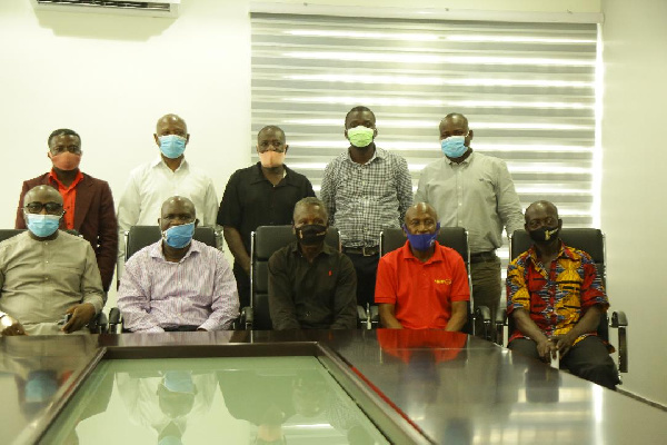 A delegation of family and ex-team mates with GFA officials