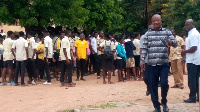 Some students of Bolgatanga Technical Institute watching on as their seniors went on rampage