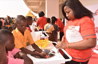 A student participating in the hand washing campaign