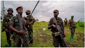 M23 rebels in Kibumba