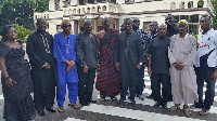 Kenpong in a photograph with the old footballers and family members at the Manhyia Palace