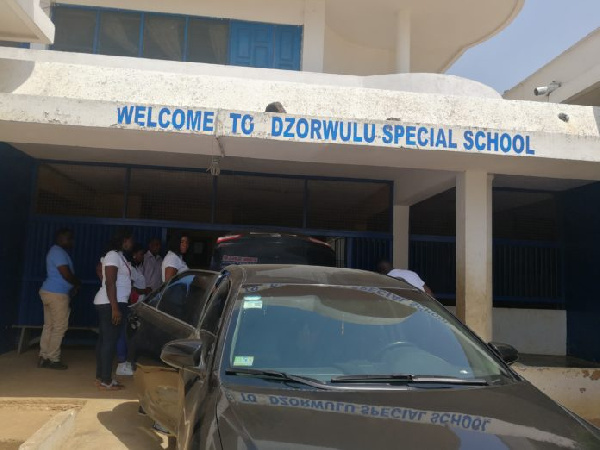 Herty Corgie's team arrive at the Dzorwulu Special School