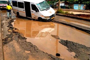 The deep potholes have forced many drivers to avoid the area