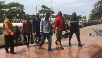 Some of the suspects in the company of the Police