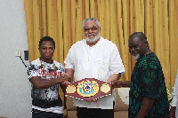 Former President John Mahama(M) with Isaac Dogboe(L) and Azumah Nelson(L)