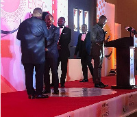 Country Manager, Francis Kpolu receiving the awards on behalf of AMERI Energy