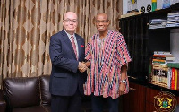 Robert P. Jackson, US Ambassador to Ghana in a handshake with Mustapha Hamid