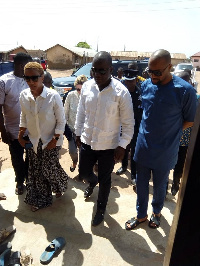 Abu Jinapor(white shirt) with Valerie Obaze and a delegation to tour the site of construction