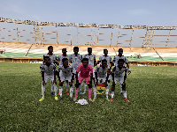 The Black Satellites team line up before the game