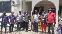 The regional Chairman in a group photo with party executives and Mr Sam Atta Mills