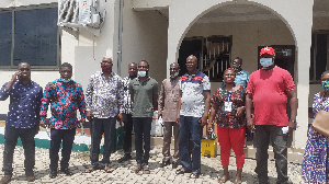 The regional Chairman in a group photo with party executives and Mr Sam Atta Mills