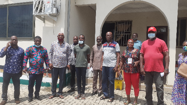 The regional Chairman in a group photo with party executives and Mr Sam Atta Mills