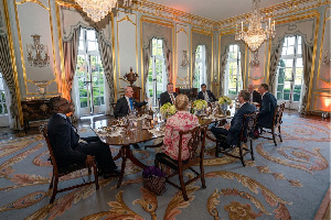 Bernard Mensah at a round table discussion with the dignitaries