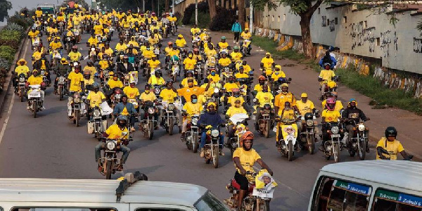 Supporters of incumbent Ugandan Presdent Yoweri Museveni celebrate on the streets of Kampala