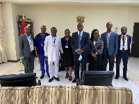 Justice Anin Yeboah in a group photo with the committee members