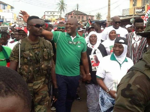 Ibrahim Mahama being escorted by some military personnel