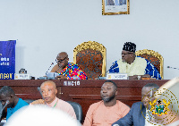 Ogyeahohoo Yaw Gyebi II (in Kente) addresses the gathering