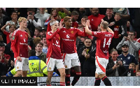 Manchester United striker Marcus Rashford (second right) celebrates scoring against Barnsley