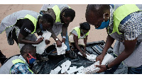 Electoral commission officials start to count ballot papers for the presidential election