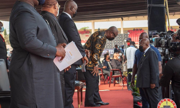 John Dramani Mahama, leader of the National Democratic Congress bowing to Akufo-Addo