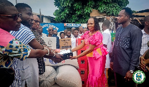 Elizabeth Kwatsoe Tawiah Sackey and other during the donation