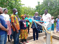 Martin Adjei-Mensah Korsah commissioning one of the many boreholes for his constituents