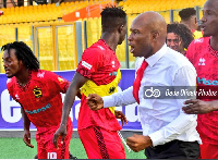 Asante Kotoko head coach, Prosper Narteh celebrating with his players