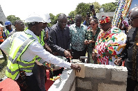 Dr Awal (middle) with others dignitaries cutting the sod for rehabilitation works to commence