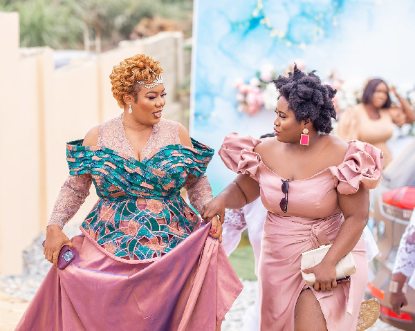 Bridget Otoo with Lydia Forson at former's wedding