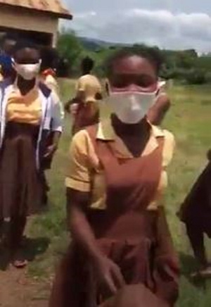 A student receiving her meal