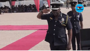 Inspector-General of Police, Mr David Asante-Apeatu pays respect to the fallen heroes