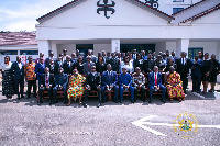 Dignitaries and participants in a group photo after the program