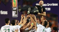 Bemadi held shoulder high by Algerian players after the final