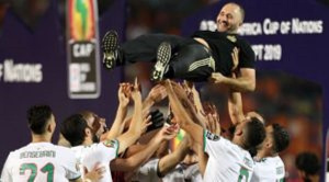 Bemadi held shoulder high by Algerian players after the final