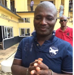 Appiah Stadium in handcuffs after being arrested