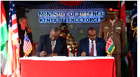 US Secretary of Defence Lloyd J. Austin III (L) and Defence Cabinet Secretary Aden Duale