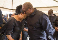 John Dramani Mahama consoling the wife of the late Lee Ocran