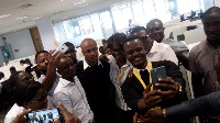 Dede Ayew in a selfie with staff of MTN