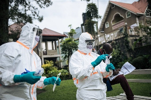 Staff Members Of The Health Ministry Perform A COVID 19 Test At A Private Residence In Goma Democrat