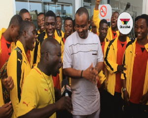 The Black Starlets with the Sports Minister Pius Enam Hadzide